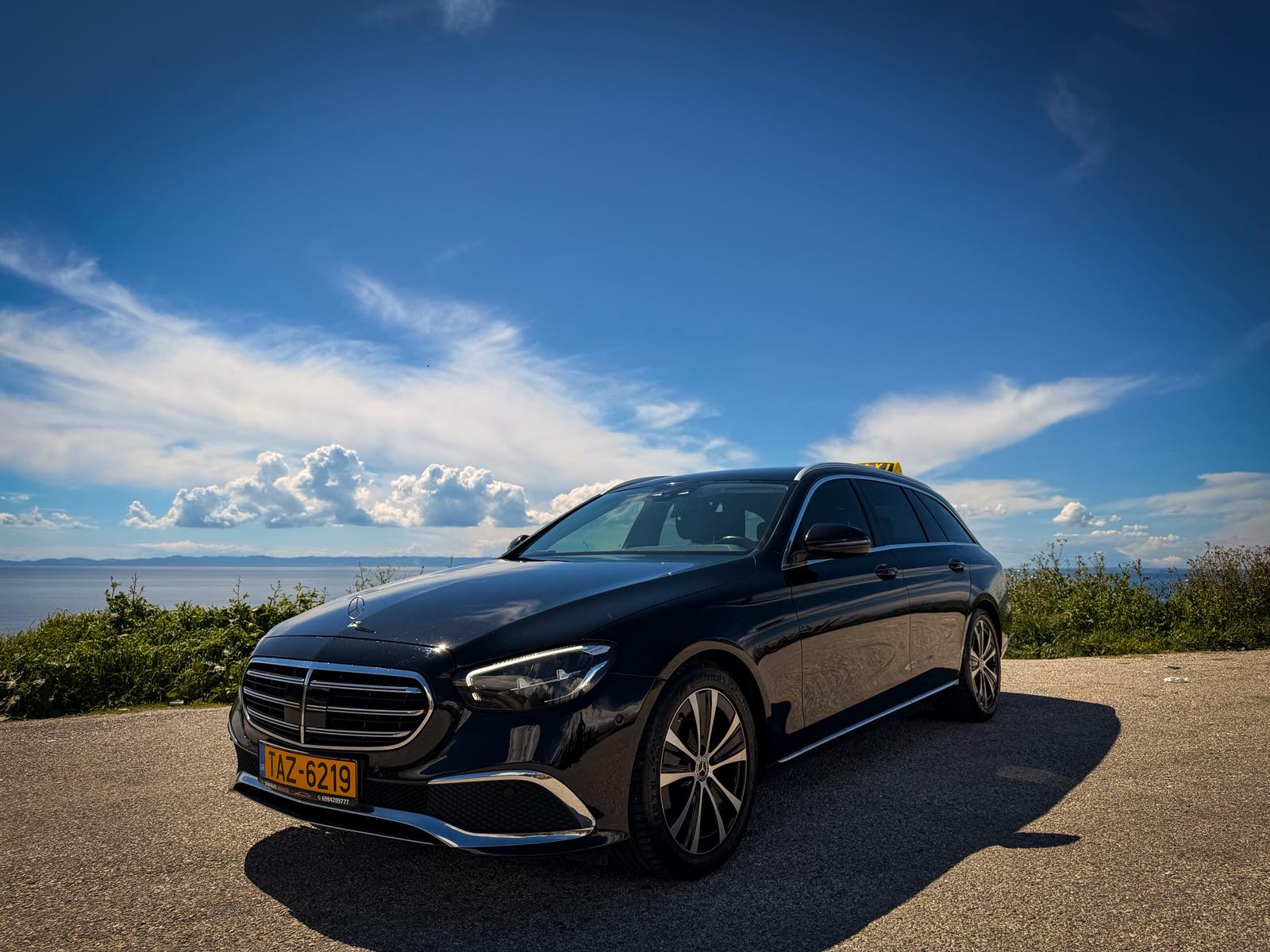 Eagle Taxi Mercedes E220 overlooking the Aegean coast near Nikiti